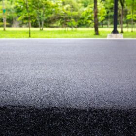 Asphalt sealcoating