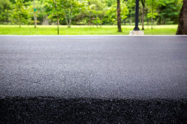 Asphalt sealcoating